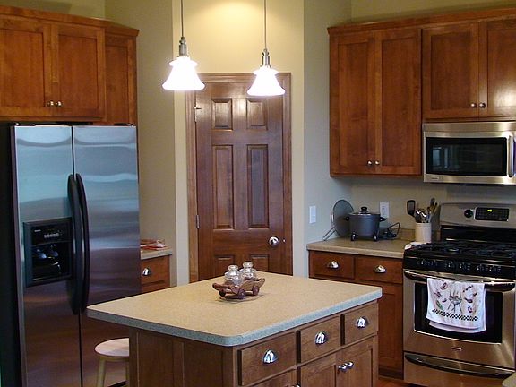 Kitchen with Stainless steel Appliances and Walk in Pantry