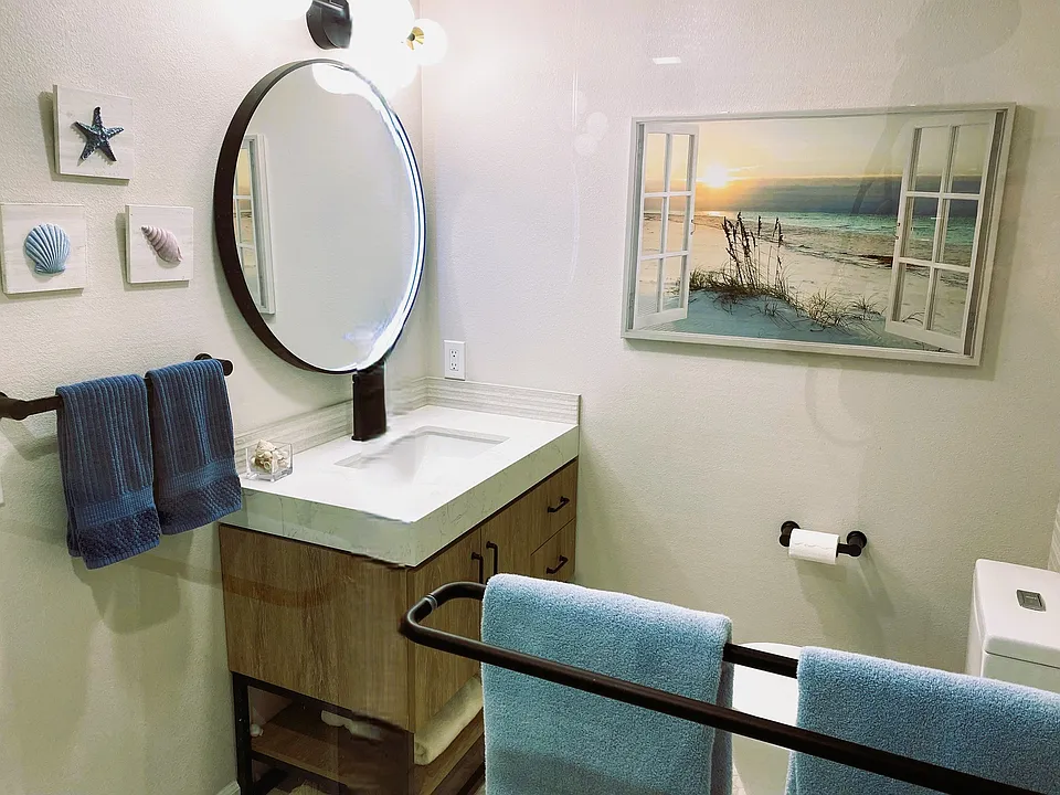 Bathroom completely renovated with all new vanity and porcelain shower.