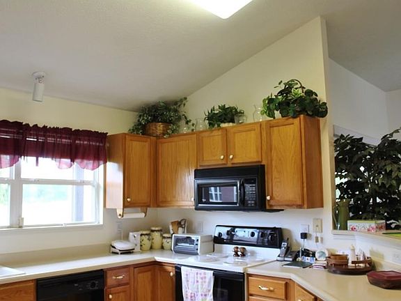 Kitchen has ample cabinets and counter tops. Kitchen appliances are included