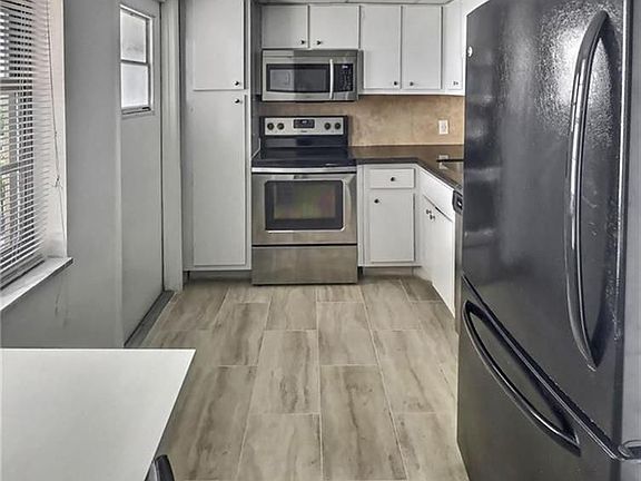 2nd image of 3000 N Palm Aire Dr APT 502