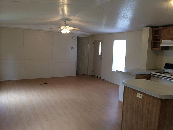 Large open kitchen and living room. This picture faces the living room.