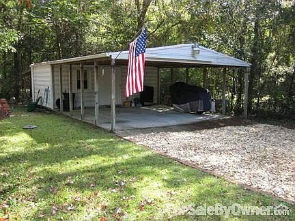 Storage shed/carport
						:
						Two car-port, with shed and lean-too on back of shed.