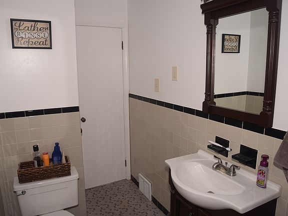 main floor tiled full bath