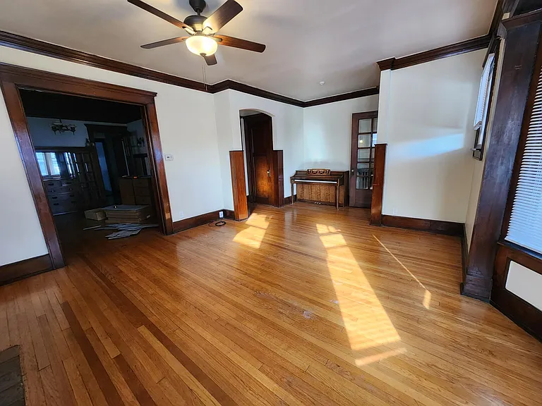 Living room looking toward Piano, dinning room, coat closet, and Bed room 1