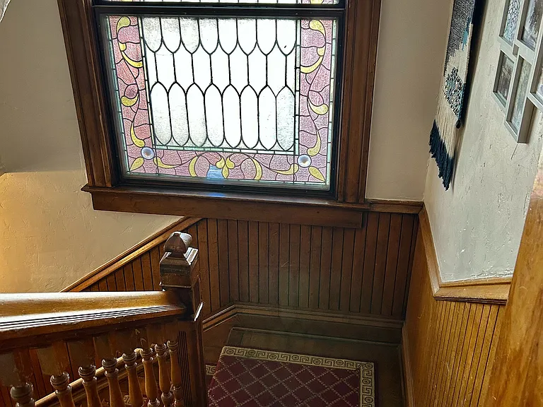 Experience timeless elegance with this beautifully crafted stained glass staircase.