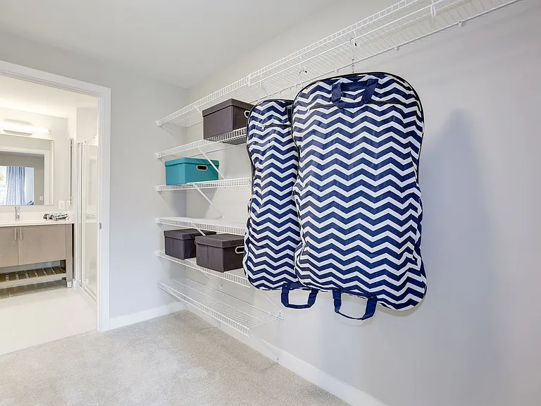 One-bedroom closet and bathroom