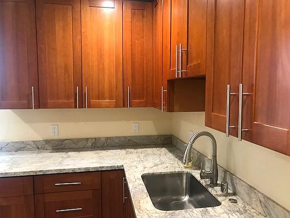 New cabinets, granite top and faucet