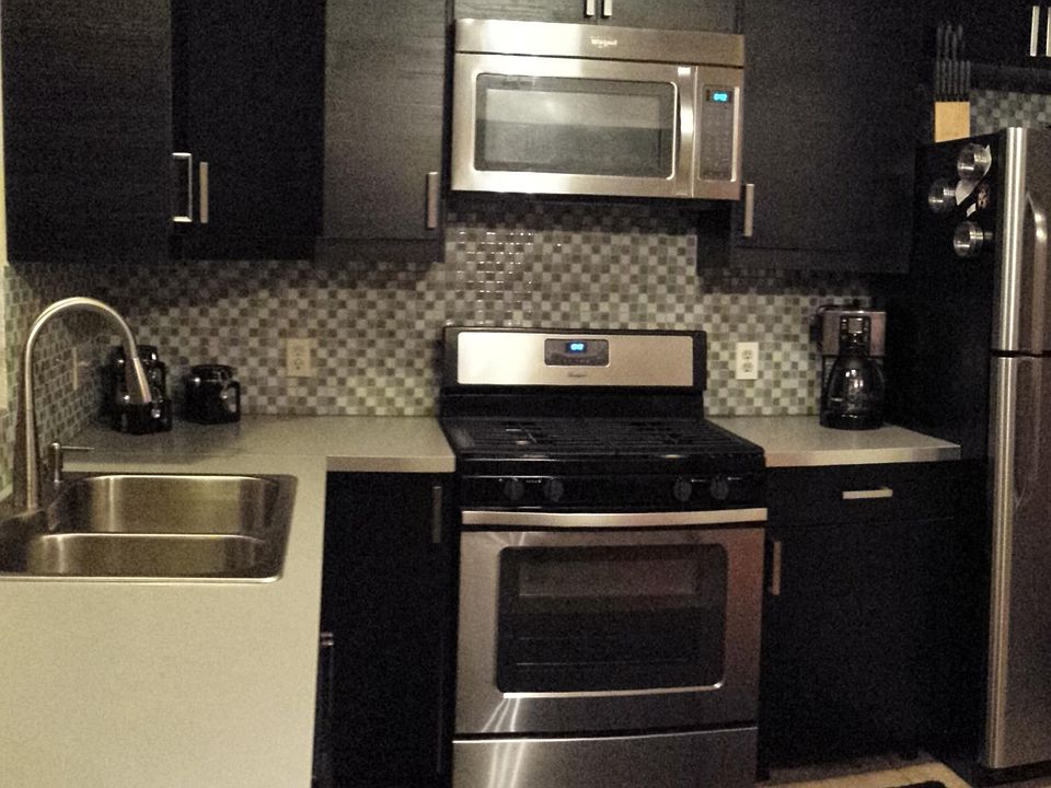 Updated kitchen with deep sink.