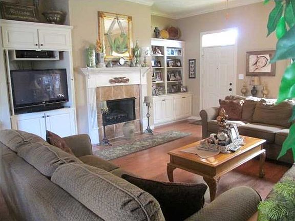 Great Room with built-ins and gas log fireplace