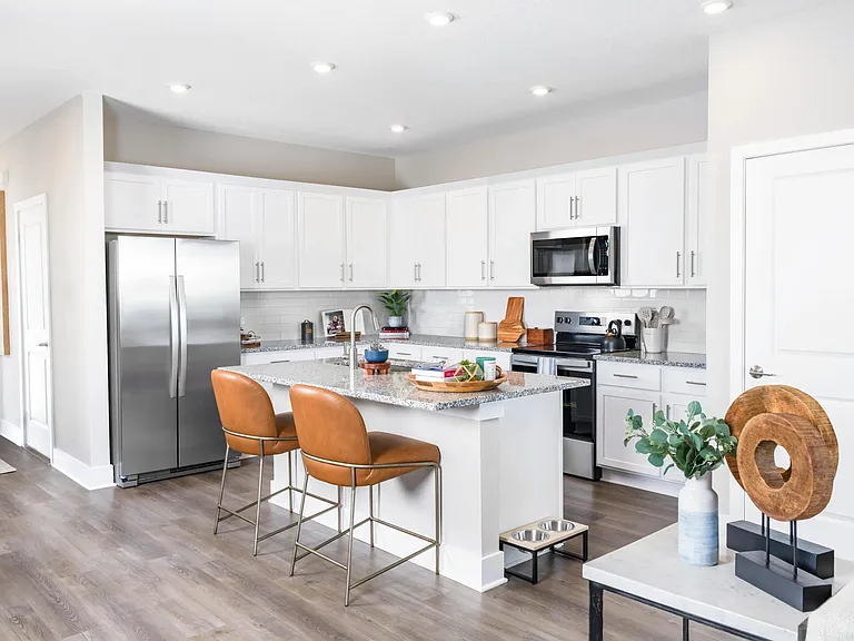 Gourmet kitchens with granite countertops offer a stylish and functional space for cooking and entertaining. Amenity image tile: Gourmet kitchens with quartz countertops