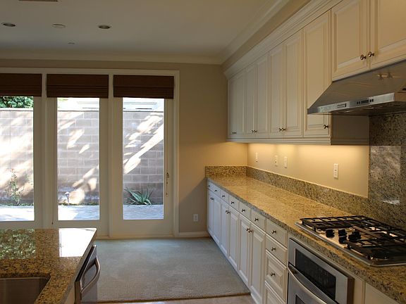 Lots of counter space and plenty of cabinets.