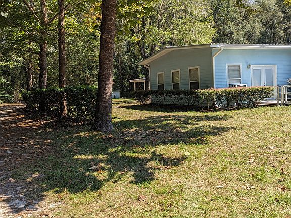 Front side view looking out towards driveway