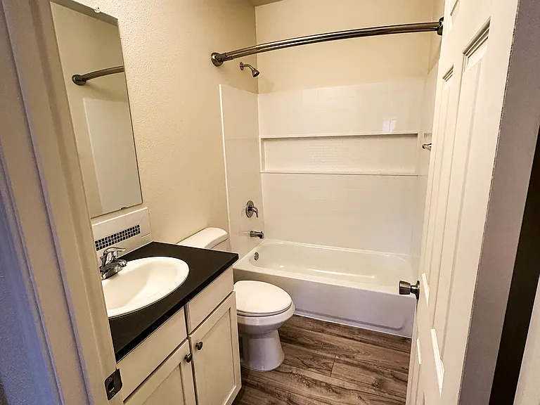 Guest / 2nd Full Bath with new surround tub & shower.