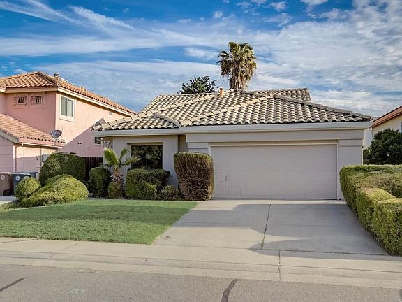 Two car garage, driveway, and plenty of street parking.