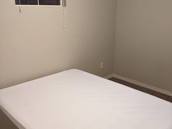 Bedroom for rent. Queen sized air mattress is shown for scale.