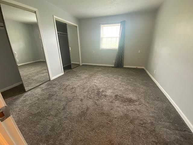 Bedroom with double closets