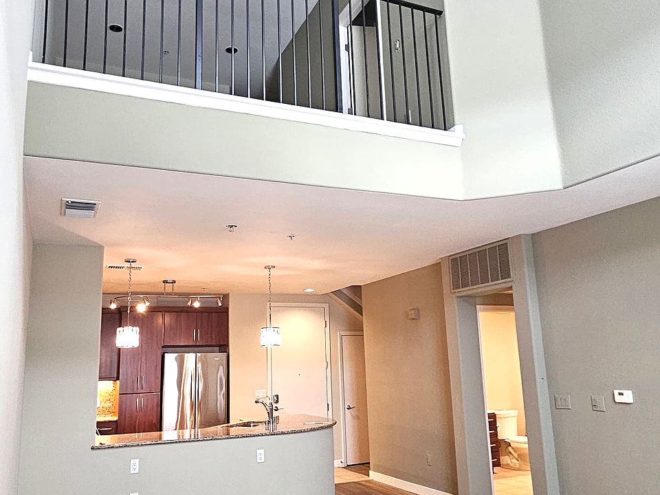 New hardwood flooring throughout with high ceilings and bright, sun-filled interiors
