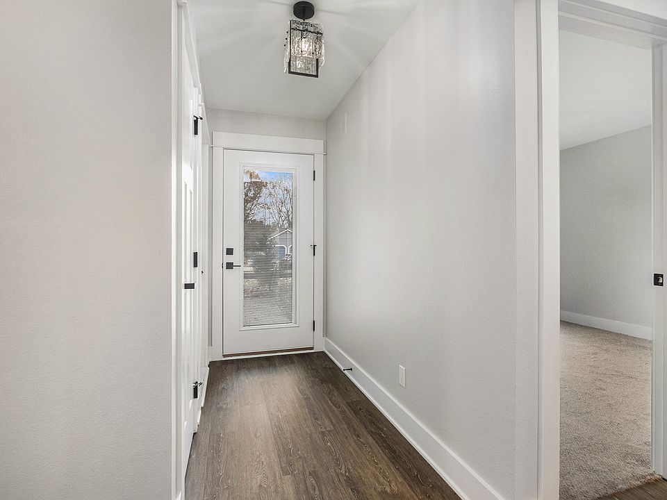 Foyer with Front Door, Closet and Side Door to Garage