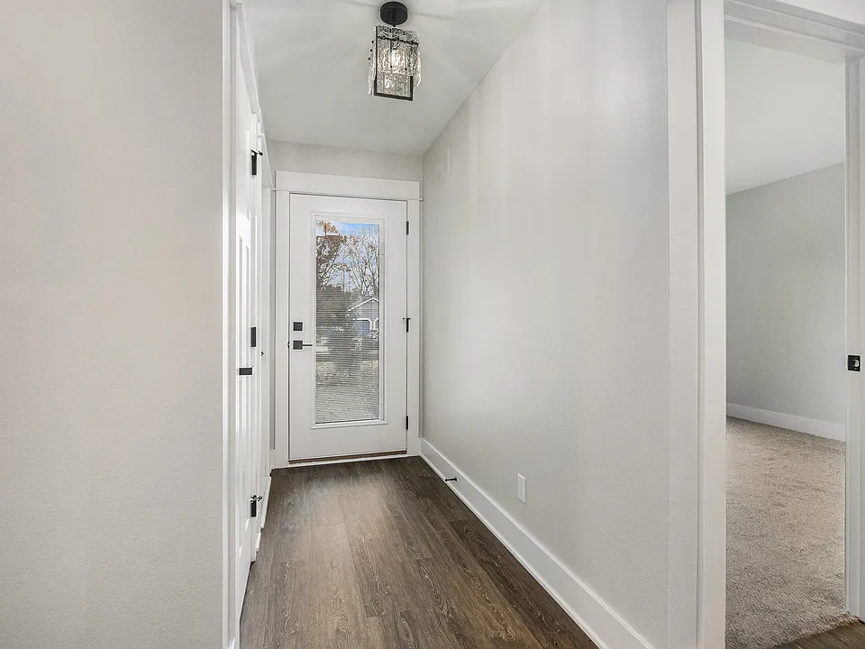 Foyer with Front Door, Closet and Side Door to Garage
