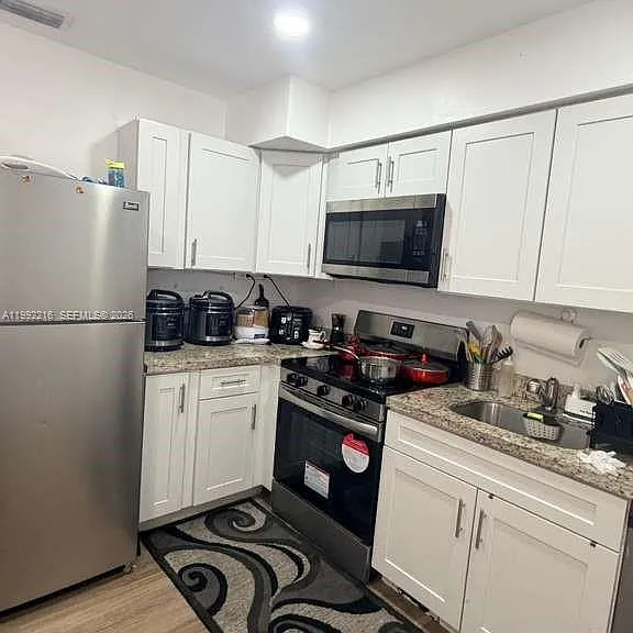 673 W 30th St #671 — Photo 13