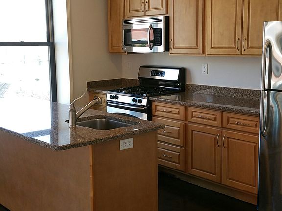 Brand new appliances, great windows, bar countertop