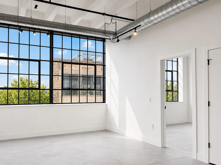 Bright Industrial Apartment Interior at Cole Motor Apartments in Indianapolis