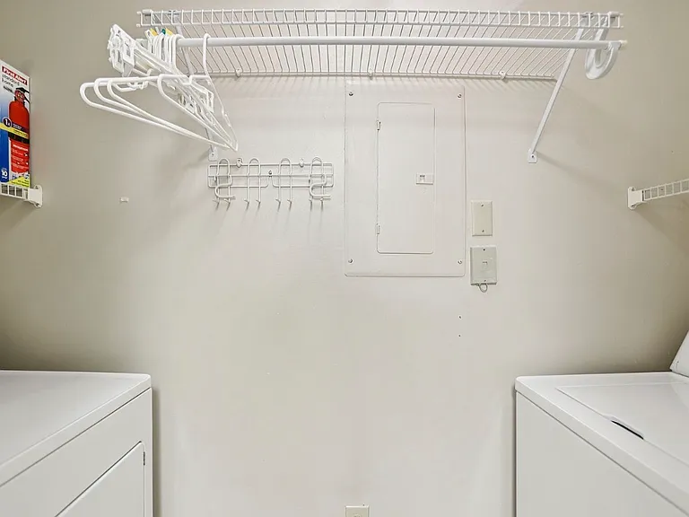 Laundry room with full size washer and dryer