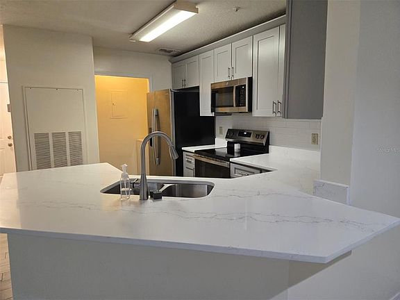 3rd image of 7667 N WICKHAM ROAD #1202