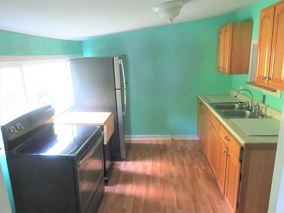 Stove and refrigerator stay.