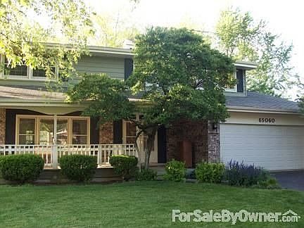 New Roof and Siding Summer 2012
						:
						GAF Architectural shingles in Weathered Wood. Vinyl Siding in Pebble Clay.
