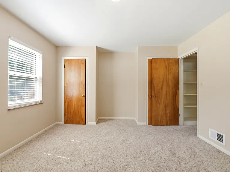 Main bedroom. TWO closets! With an area between for a cabinet and/or your TV.