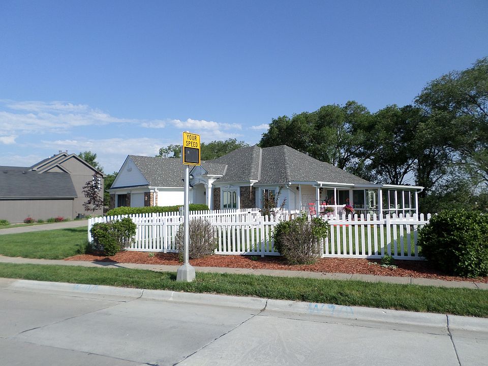 SE corner of house w/sunroom