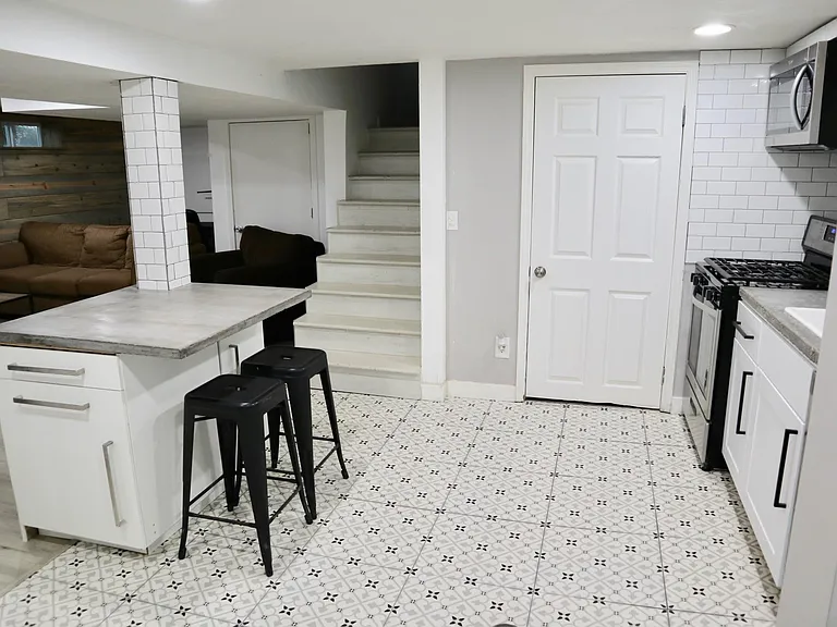 lots of storage in island. modern concrete counters