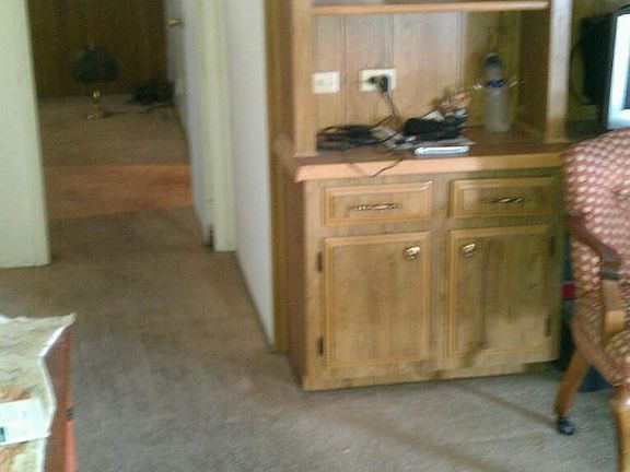 Den area leading to bedrooms