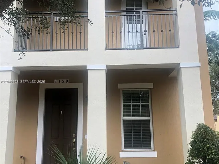 1129 SW 147th Ter #1129 — Photo 1