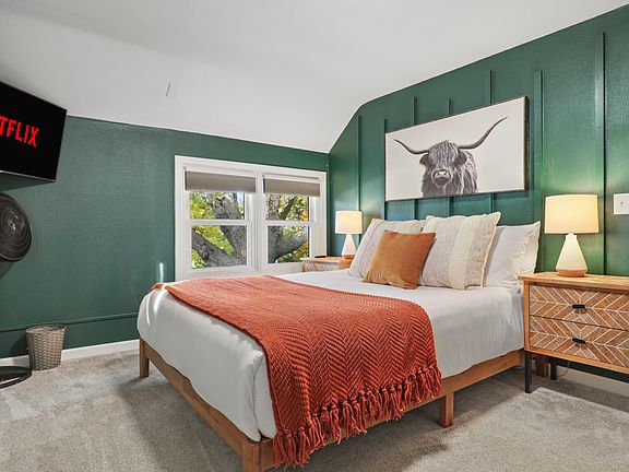 Queen bed, 40" smart TV, dedicated workspace, closet storage, black out blinds.