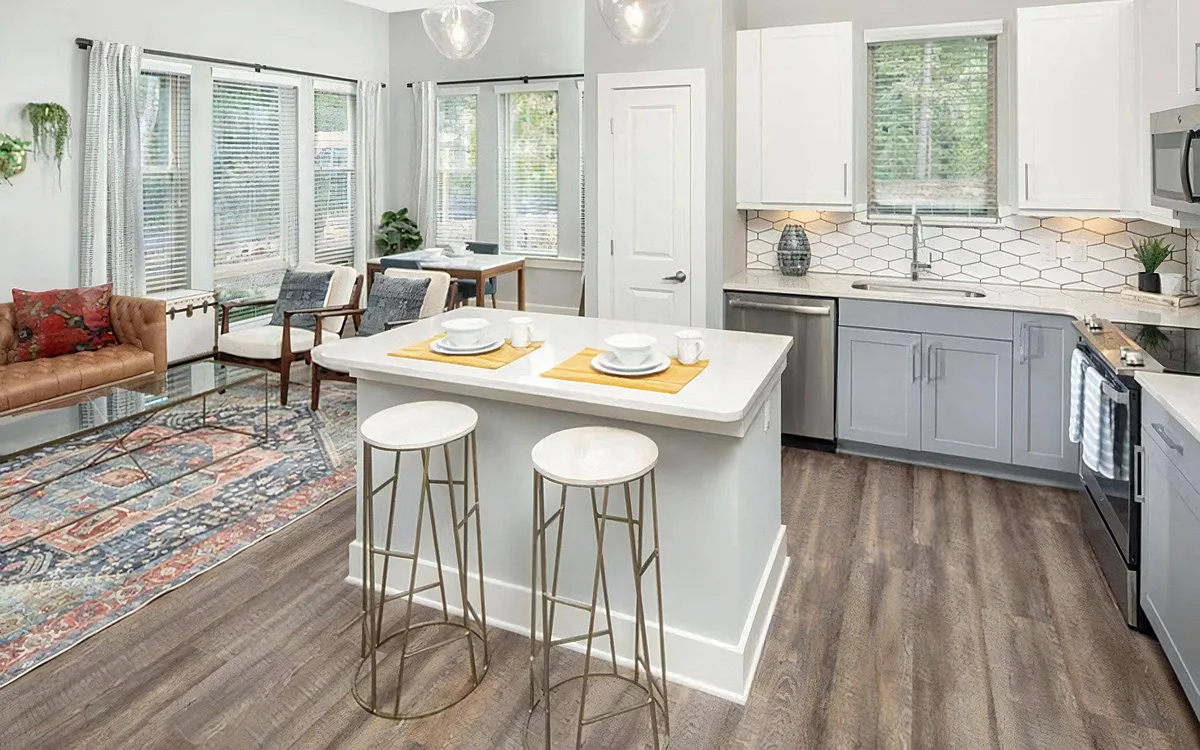 Photo 1 of 68 - Broadstone Trailside - Morrisville, NC Island Kitchen with Breakfast Bar, Ample Cabinet Space, and Self-Closing Drawers - Broadstone Trailside