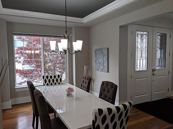 Formal Dining Room with coffered ceiling