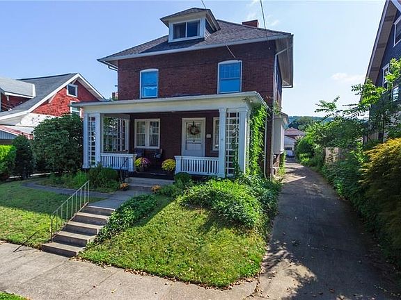 Private Driveway, allows for off street parking and 2 car detached garage.