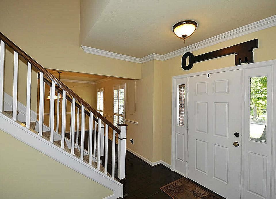 Two story foyer with solid wood door!Bright & spacious rooms throughout!New paint inside & outside!