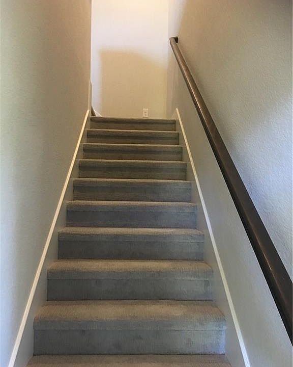 Stairs leading to apartment unit