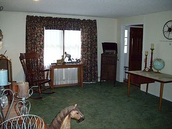 Living room looking to front door area.
