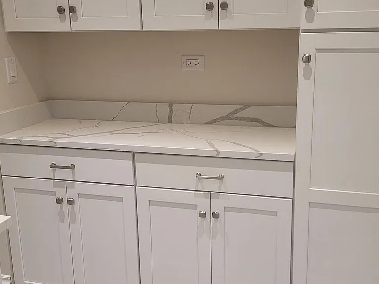 Partial Kitchen view with self-closing doors/drawers