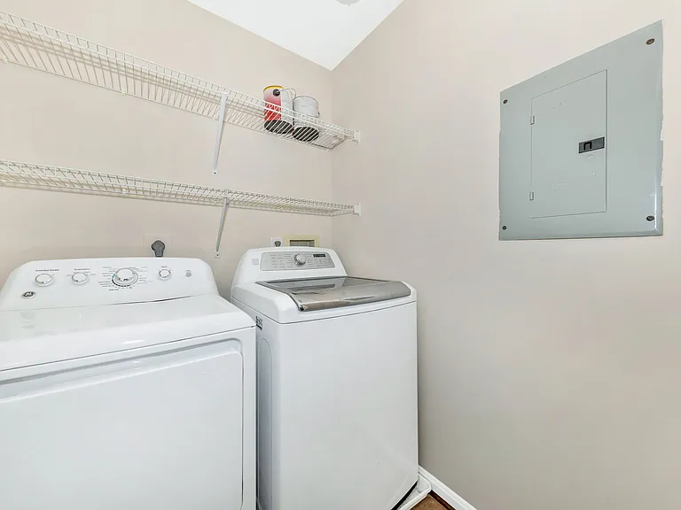 Separate IN UNIT laundry room and storage space.