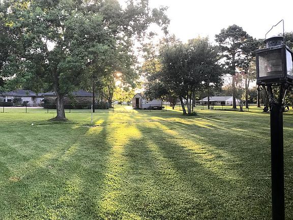 large, fenced back yard.