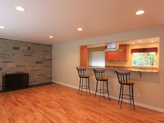 Living Rm with Granite Bar & Fireplace