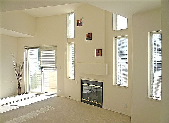 Loads of natural light in this 3 level end unit townhome