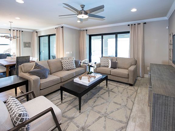 Model Representation Gathering room with ample light and space to entertain