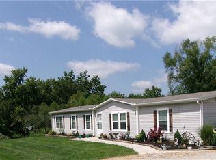 409 E 4th St, Creighton, MO 64739