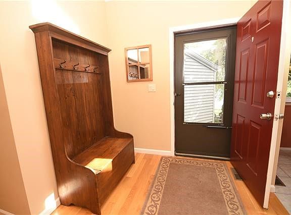 The sun filled foyer welcomes you into this wonderful home.  Gleaming hardwood flooring throughout.